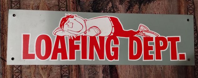 Vintage Loafing Department novelty metal sign, 14x4"
