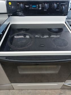 Whirlpool almond and black glasstop stove - Free deliery