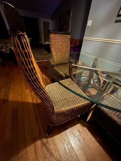Dining room set glass table four chairs. From Malaysia.