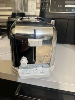 Like new cusiriant Classic Style Electronic Chrome Toaster