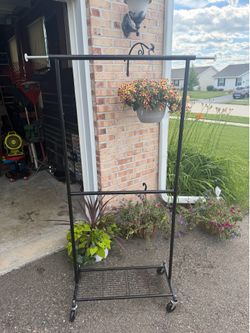 Black Clothes Hanger on Wheels