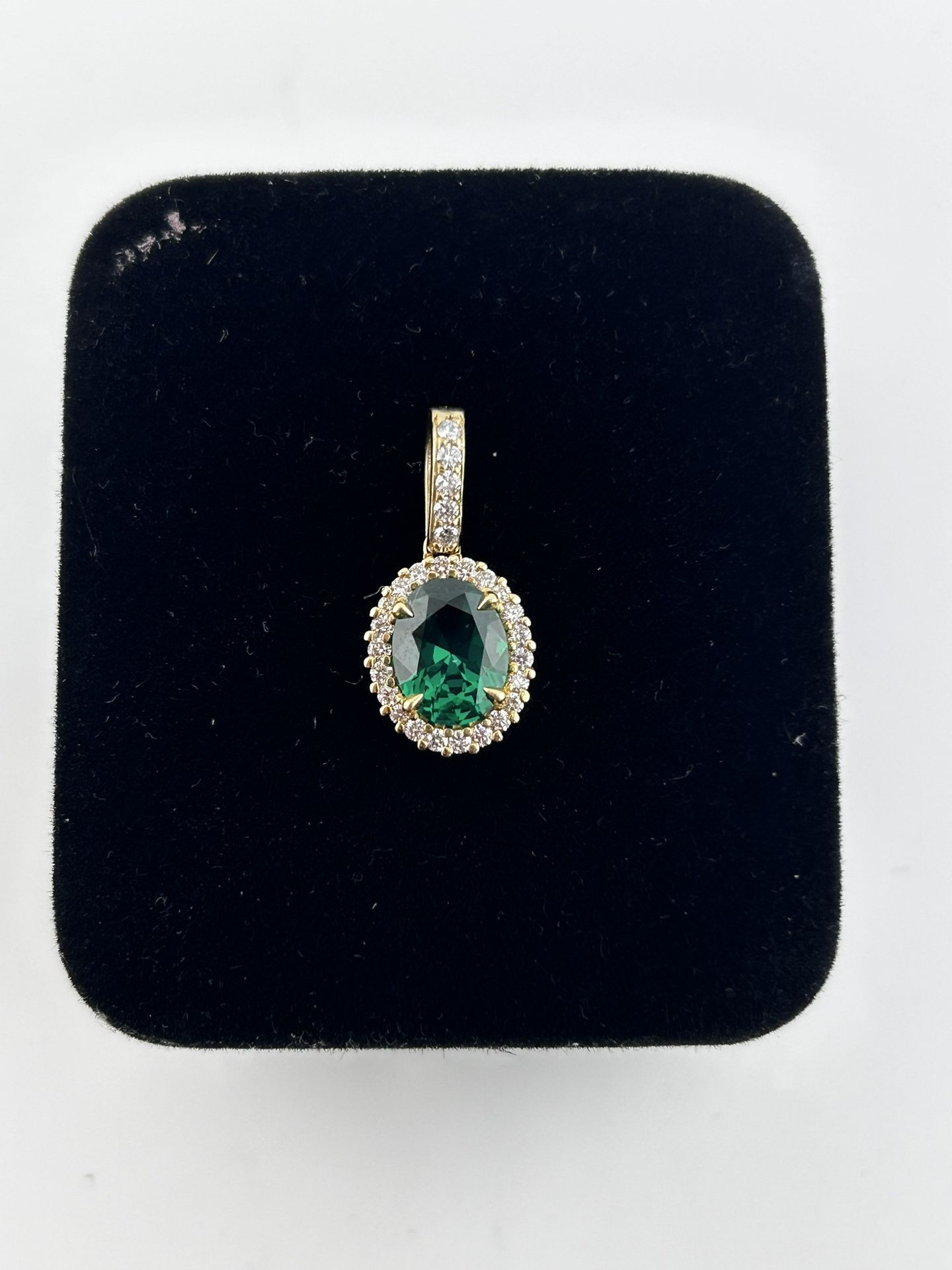Halo Oval Emerald and Diamond Pendant