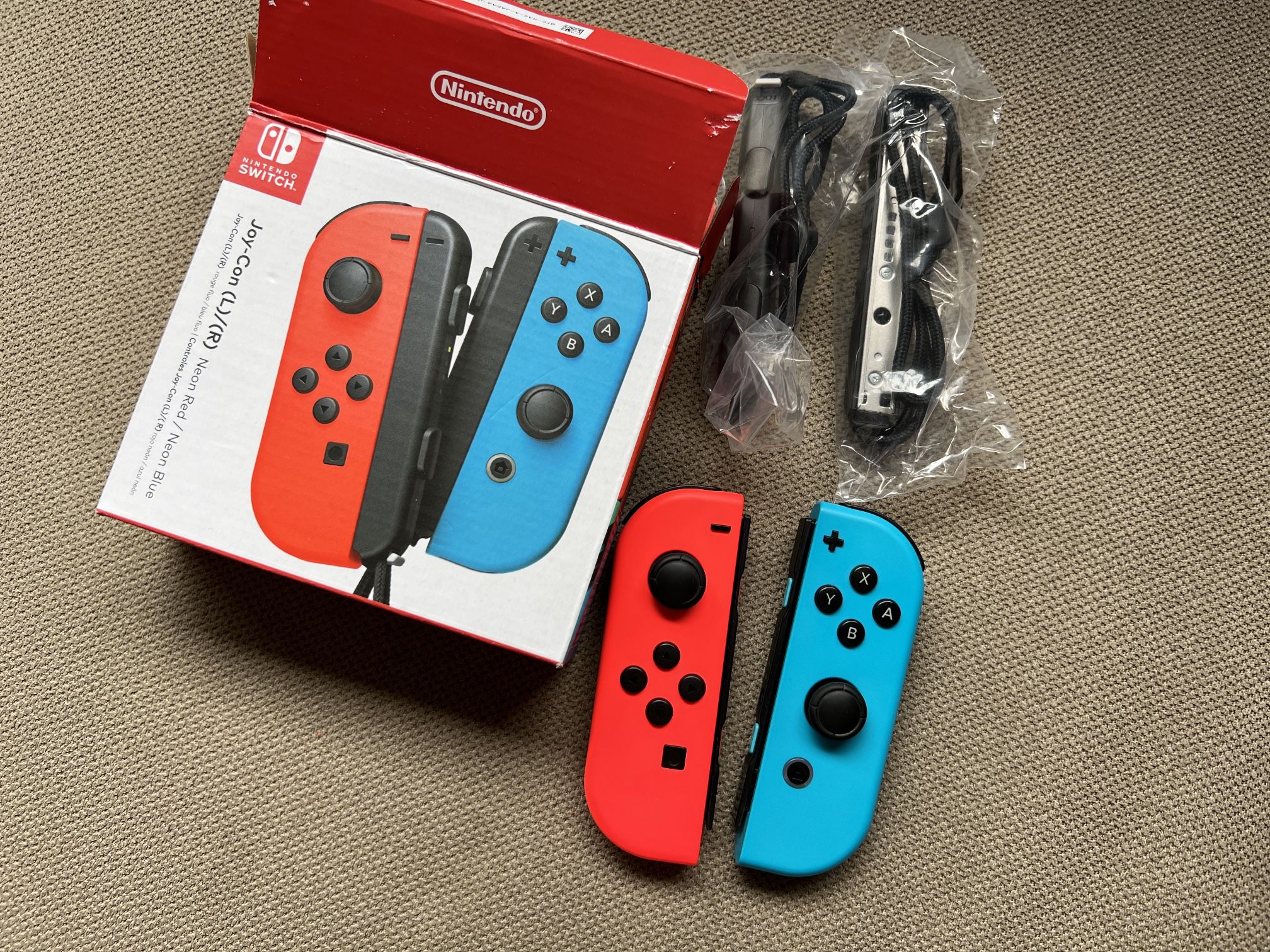 Nintendo Joy-Con (L/R) - Neon Red/Neon Blue - Barely Used - Near Mint Condition