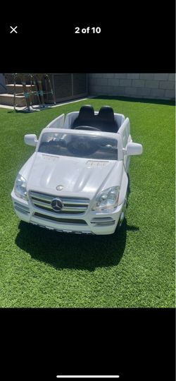 White Mercedes-Benz ride-on toy car