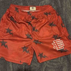 Orange and black Eric Emmanuel shorts size M