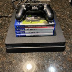 PS4 With Controller And Games