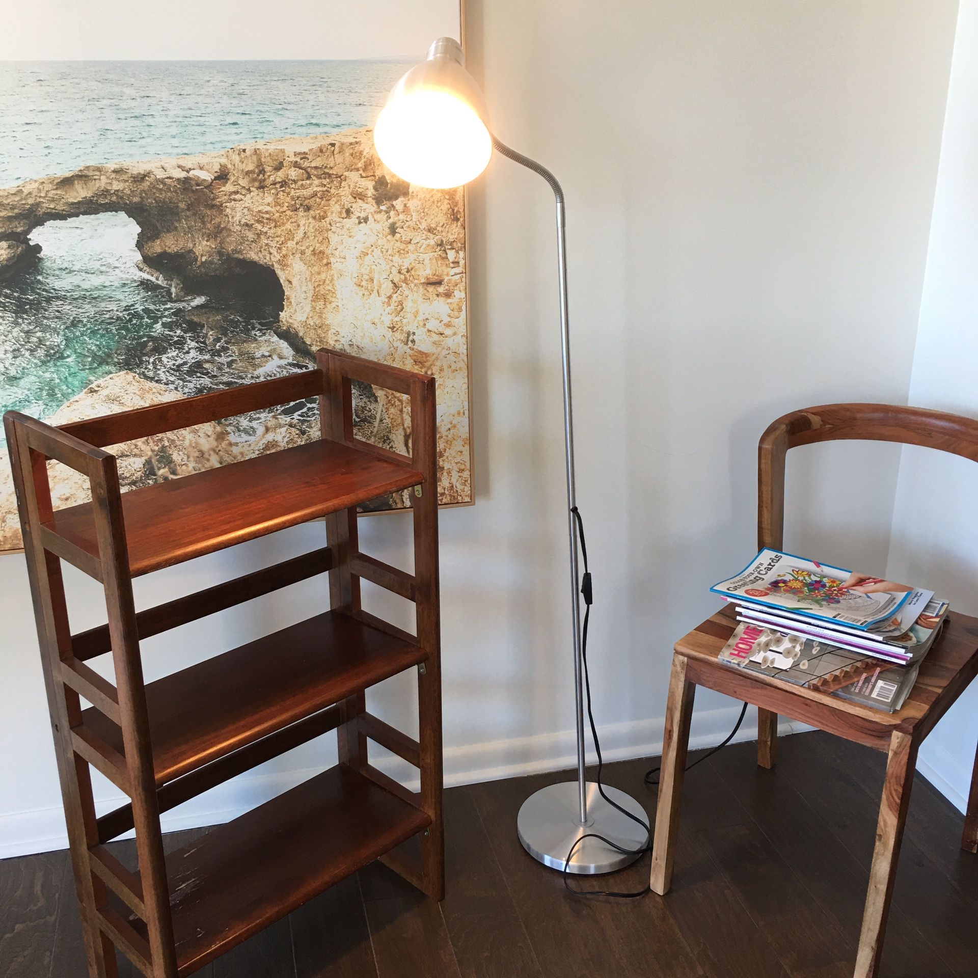 Brown crate & Barrel folding bookshelves with an IKEA lamp - $35