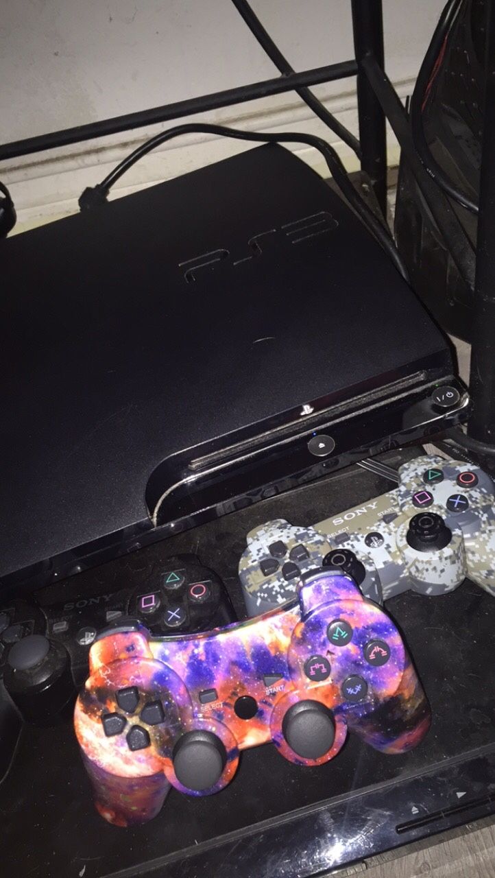 Ps3 with controllers and games