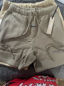 Wo wants to cop any essential shorts or bape shirts in bape shirts no more small just medium and large and the we have the essentials shorts in small 