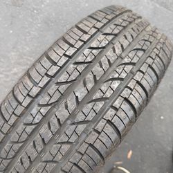 Single (1) 185 70 14 Douglas all season tire 