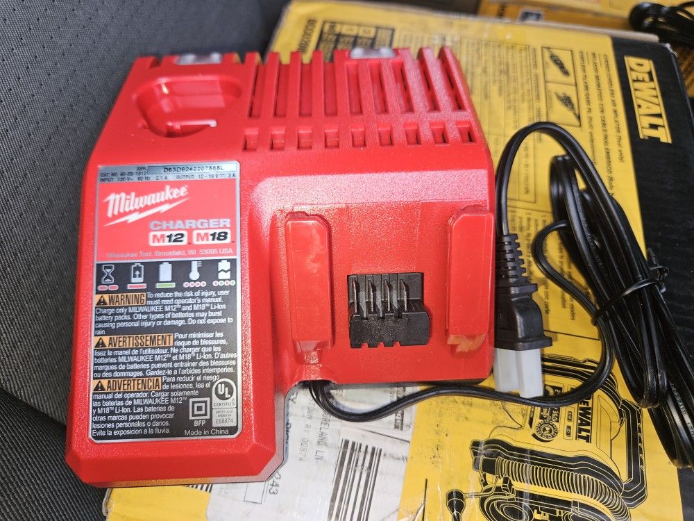 Milwaukee M12 and M18 12-Volt/18-Volt Battery Charger(FIRM 25.00)