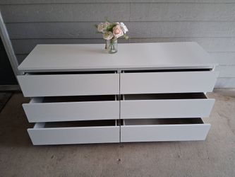 White dresser ( 63 length x 30 high x19 deep) looks like new .