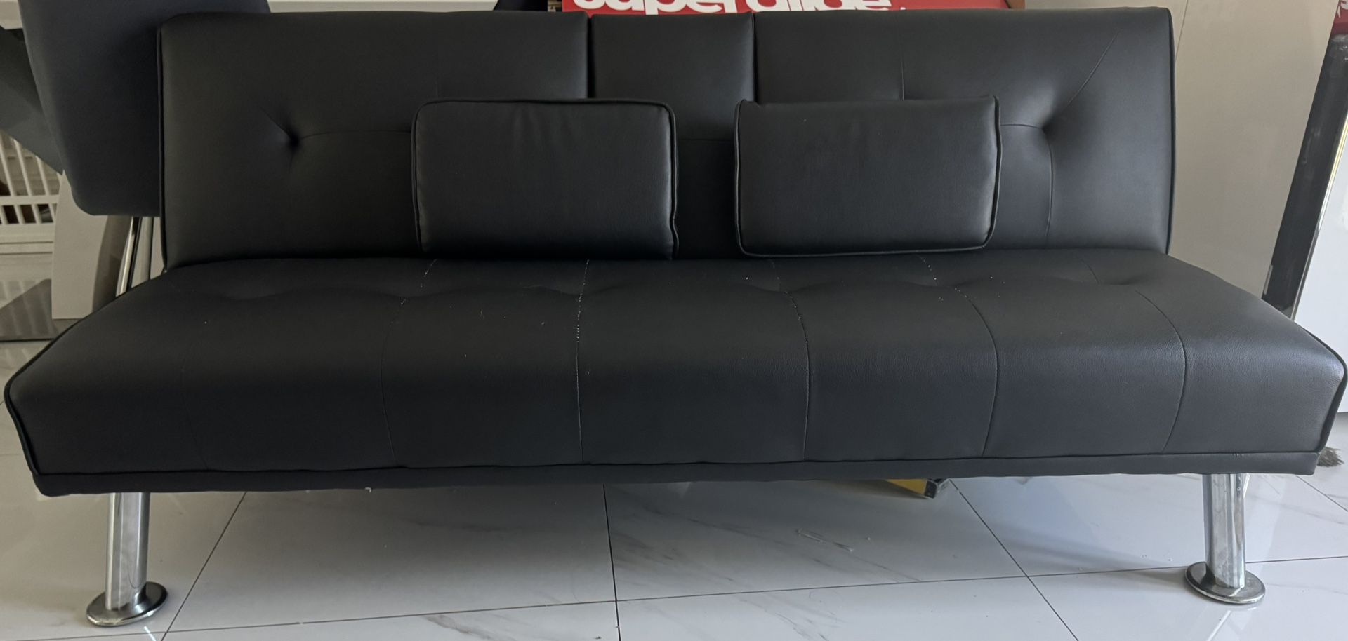LEATHER SOFA FUTON WITH 2 PILLOWS AND CUP HOLDERS LIKE NEW