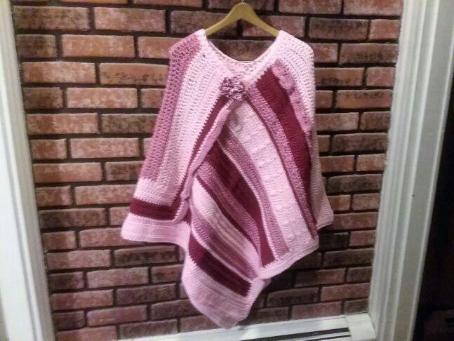 New, one of a kind, ladies or teenagers poncho