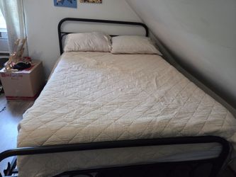 Full size black metal frame with mattress