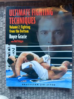 Royce Gracie autographed book fight from bottom