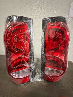 Silverado/Sierra OEM Tail Lights Complete *NEW*