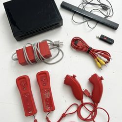 Nintendo Wii (All cords and two controllers)