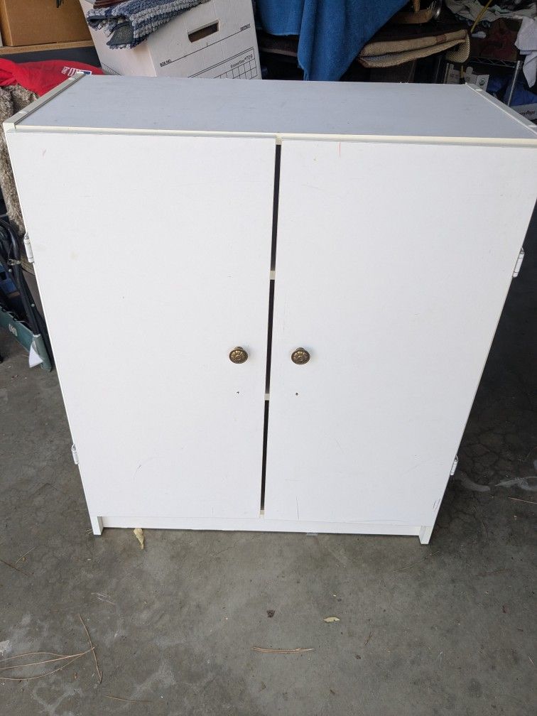 Cabinet And Metal Shelves