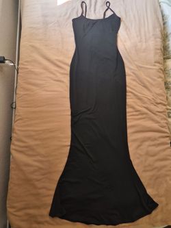 Black maxi tube dress (hugs the body)