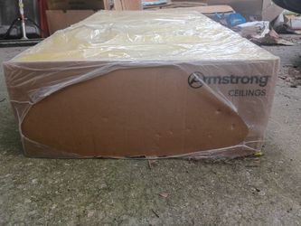 This is a box of Armstrong Ceiling Solutions (model 2911A) containing 16 ceiling tiles [5.1, 5