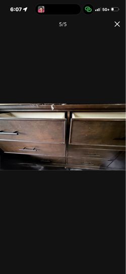 Dark Wood Dresser with Multiple Drawers
