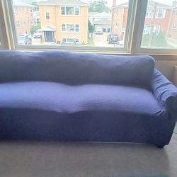 Small Couch with Navy Blue Slipcover 