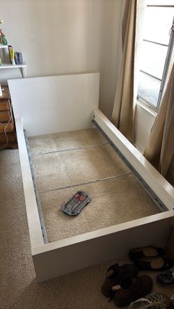 Twin bed. Frame and mattress. White