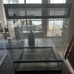Terrariums, cages, tanks