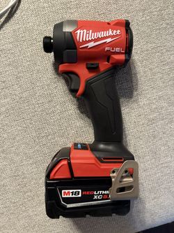 Milwaukee Impact  gun / Battery’s 