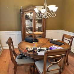Round Table, 4 Chairs And Hutch. 