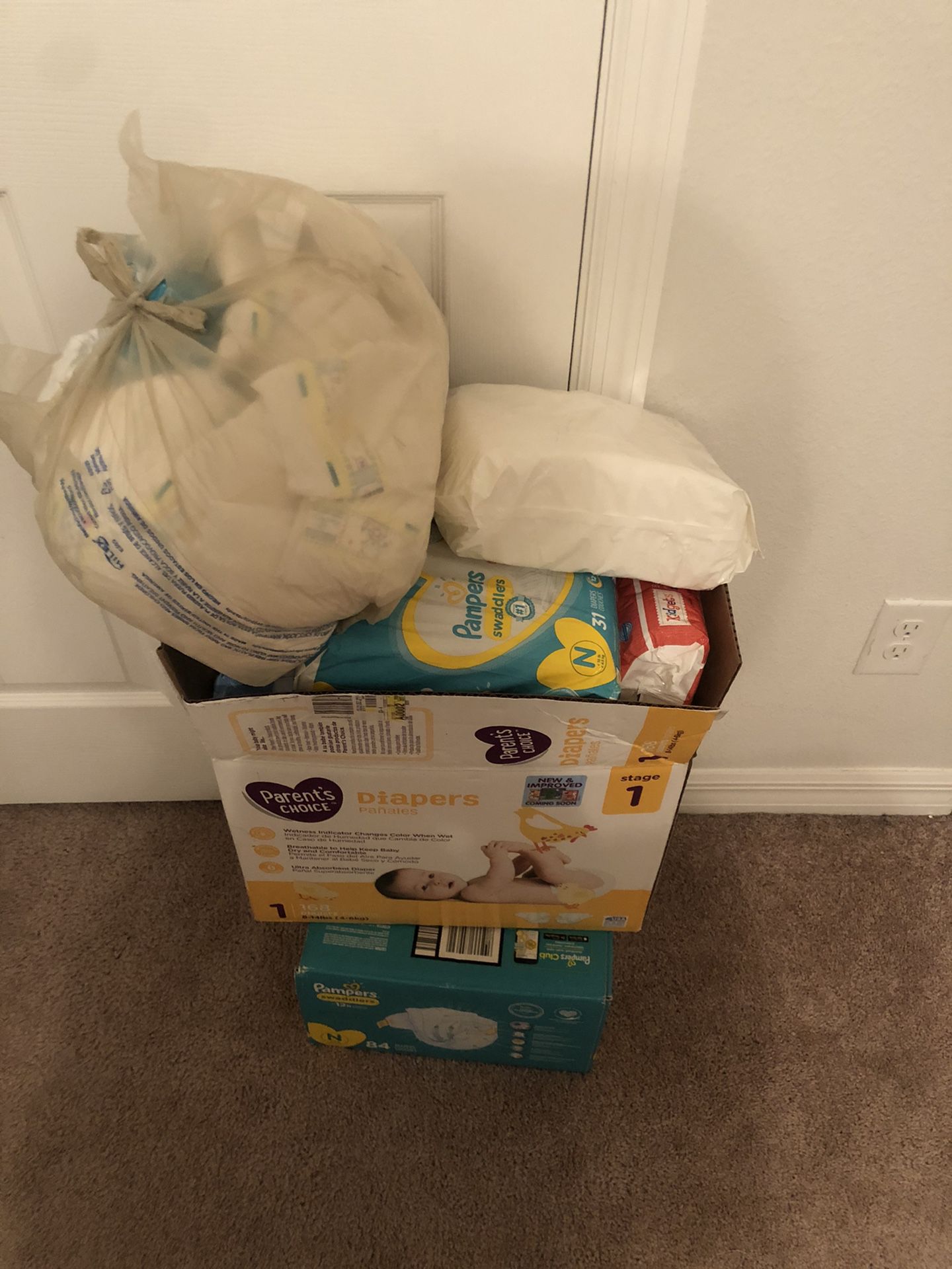 Baby diapers size newborn and 1 .. baby wipes