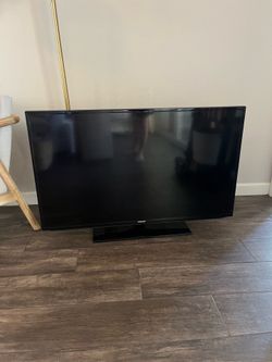 50in Samsung TV with stand flatscreen