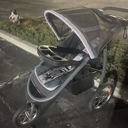 GRACO Jogging Stroller – Smooth Ride, Cup Holders, Storage Basket