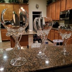 3 piece, crystal vases from Poland all 3 are different sizes, 3 to the set $,200.Never been used perfect