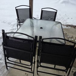 table in four chairs 