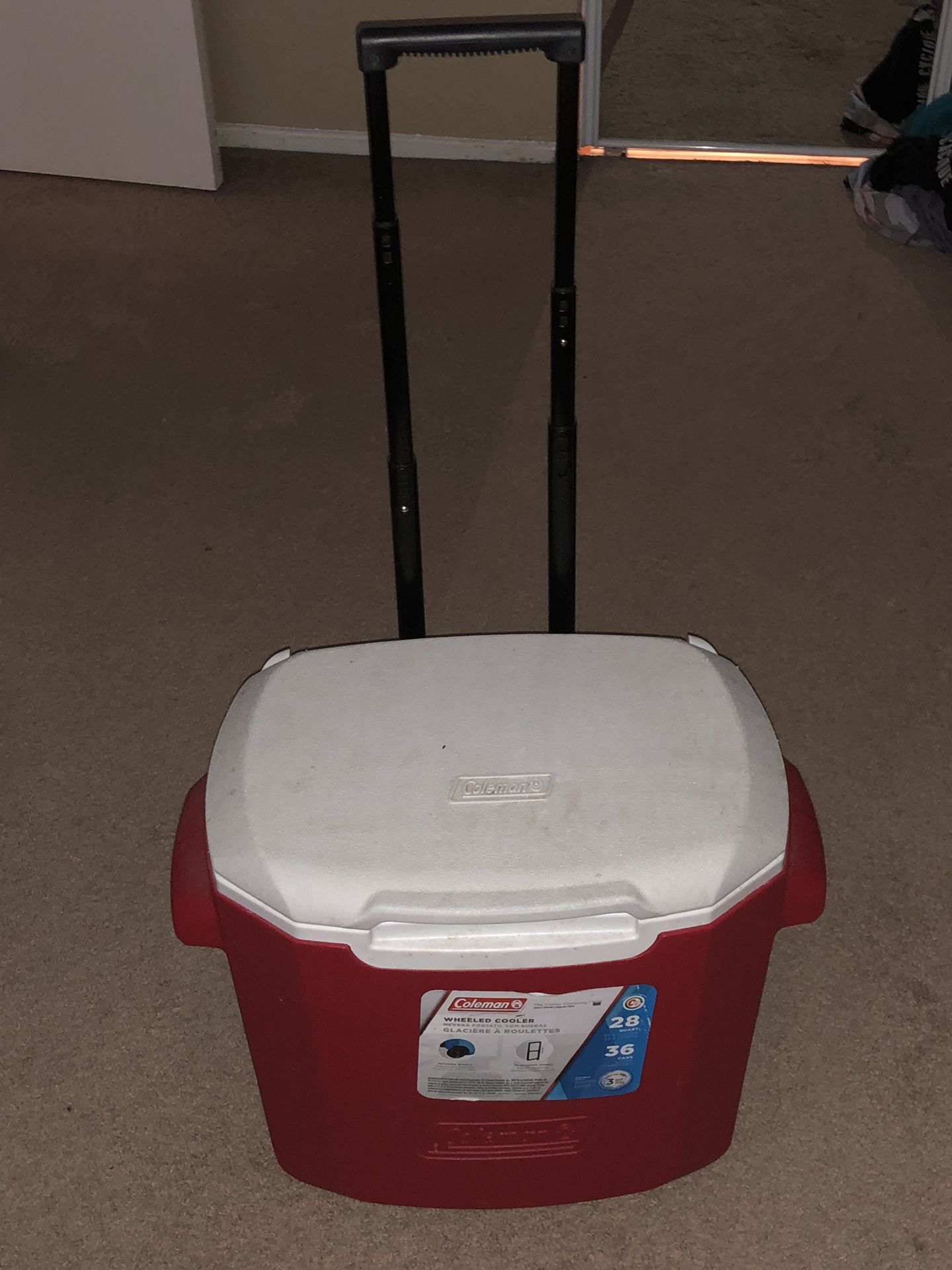 Coleman cooler with pullout handle and wheels
