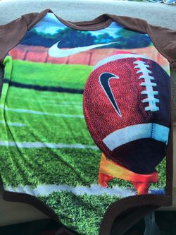 Nike- football onesie 9/12 months