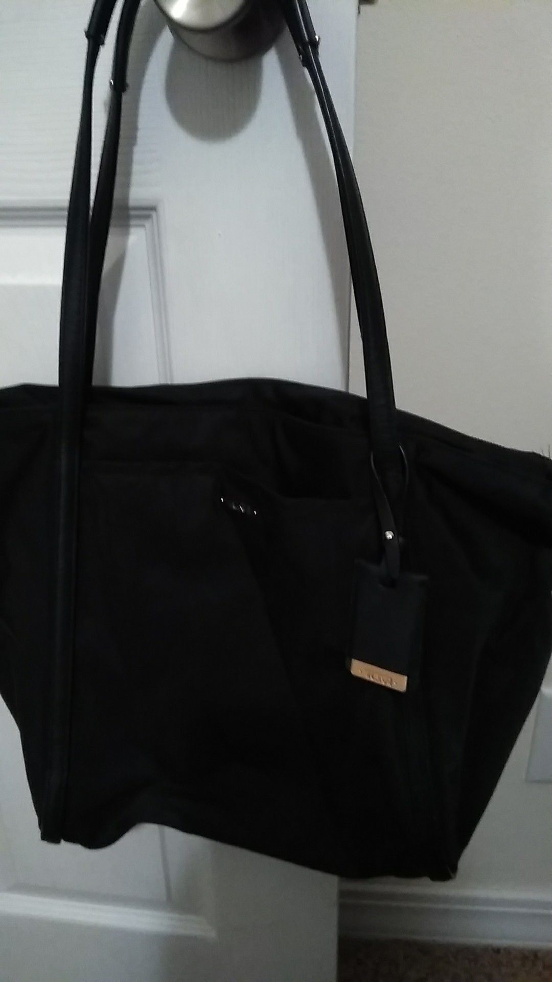 Tumi black