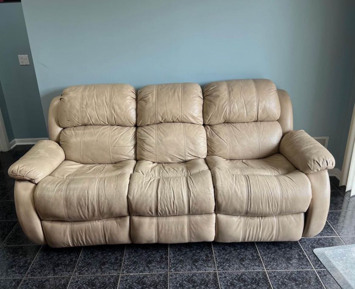 Leather Sofa W Recliner 