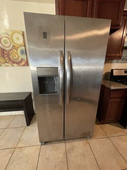 Side-By-Side Refrigerator- $400