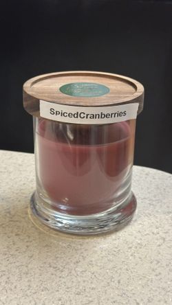 Woodwick Candle In A Clear Container With Lid.