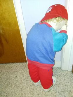 Hide in the corner hide and go seek doll.