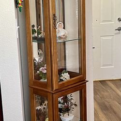 Lighted Curio Cabinet With Mirrored Back