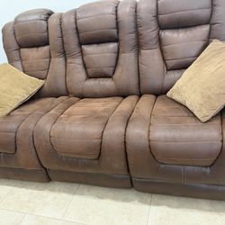 Two sofas, two recliner chairs, two small coffee tables, and one big dining table