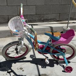 Schwinn Iris 16 inch bicycle with training wheels