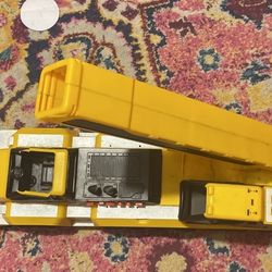 yellow toy truck