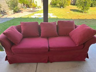 Red Fabric Loveseat with Throw Pillows
