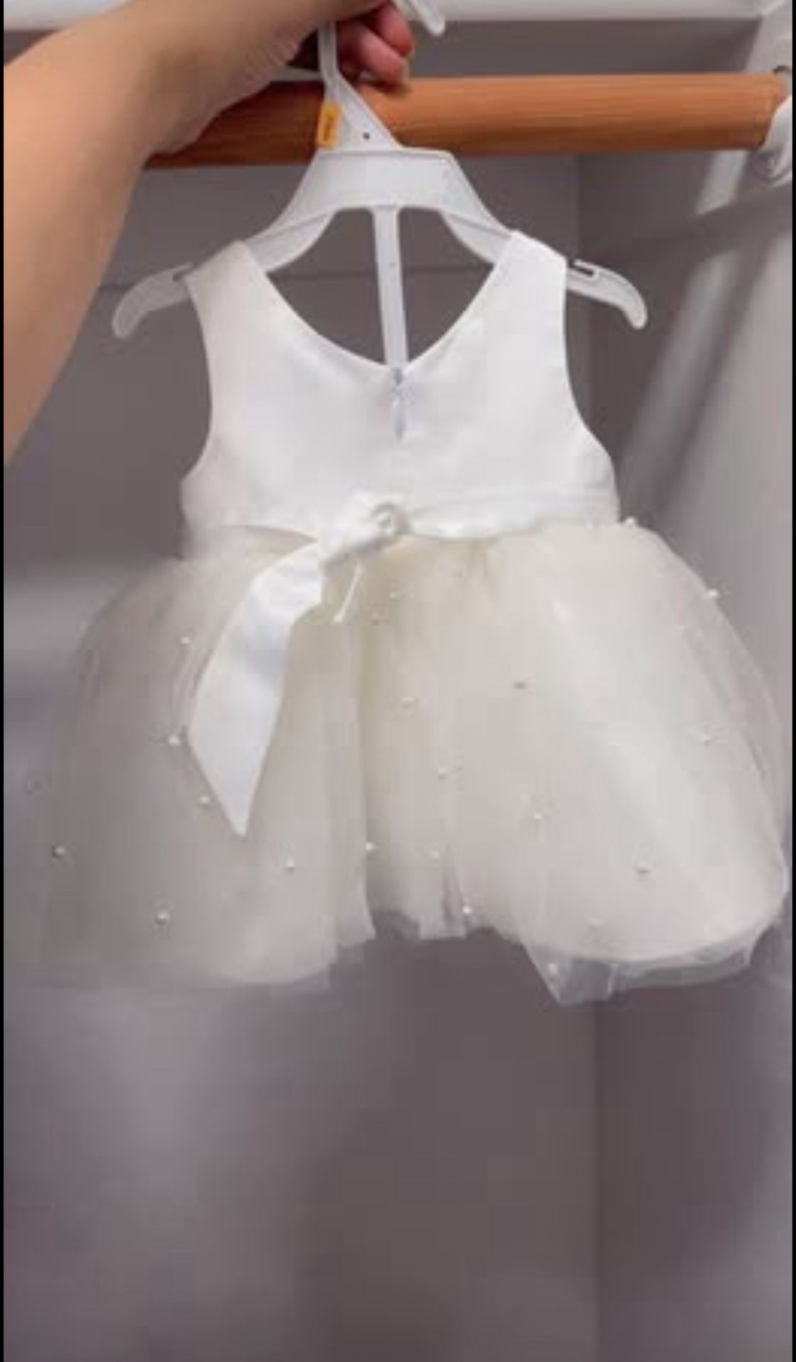 White party dress with pearls on it