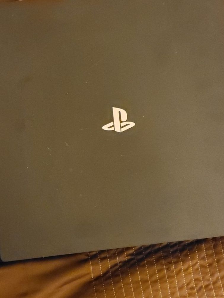 PS4 Pro 1TB, 10 GAMES, CHARGING DOCK